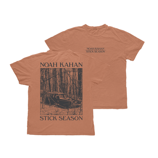 Noah Kahan Stick Season short sleeve t-shirt on Comfort Colors Yam. Pigment dyed burnt orange tee with dark grey stick season screen printed artwork. 